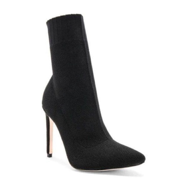 Chrissy Teigen X Revolve delta boots By Delta - Picture 4 of 9